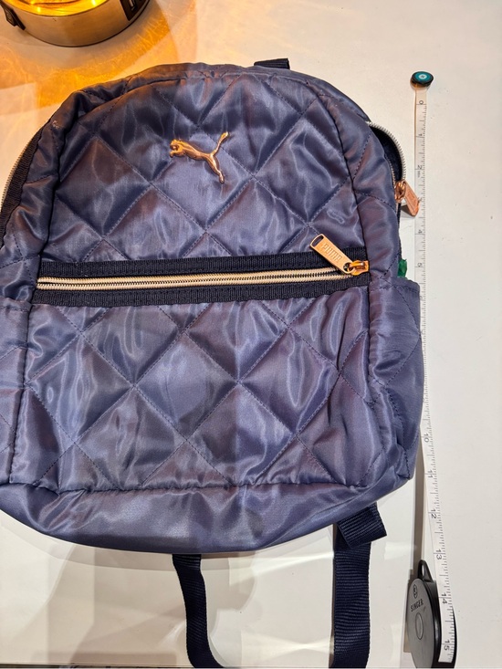 Puma Handbags - PUMA Quilted Navy Blue Mini Backpack with Gold Accent